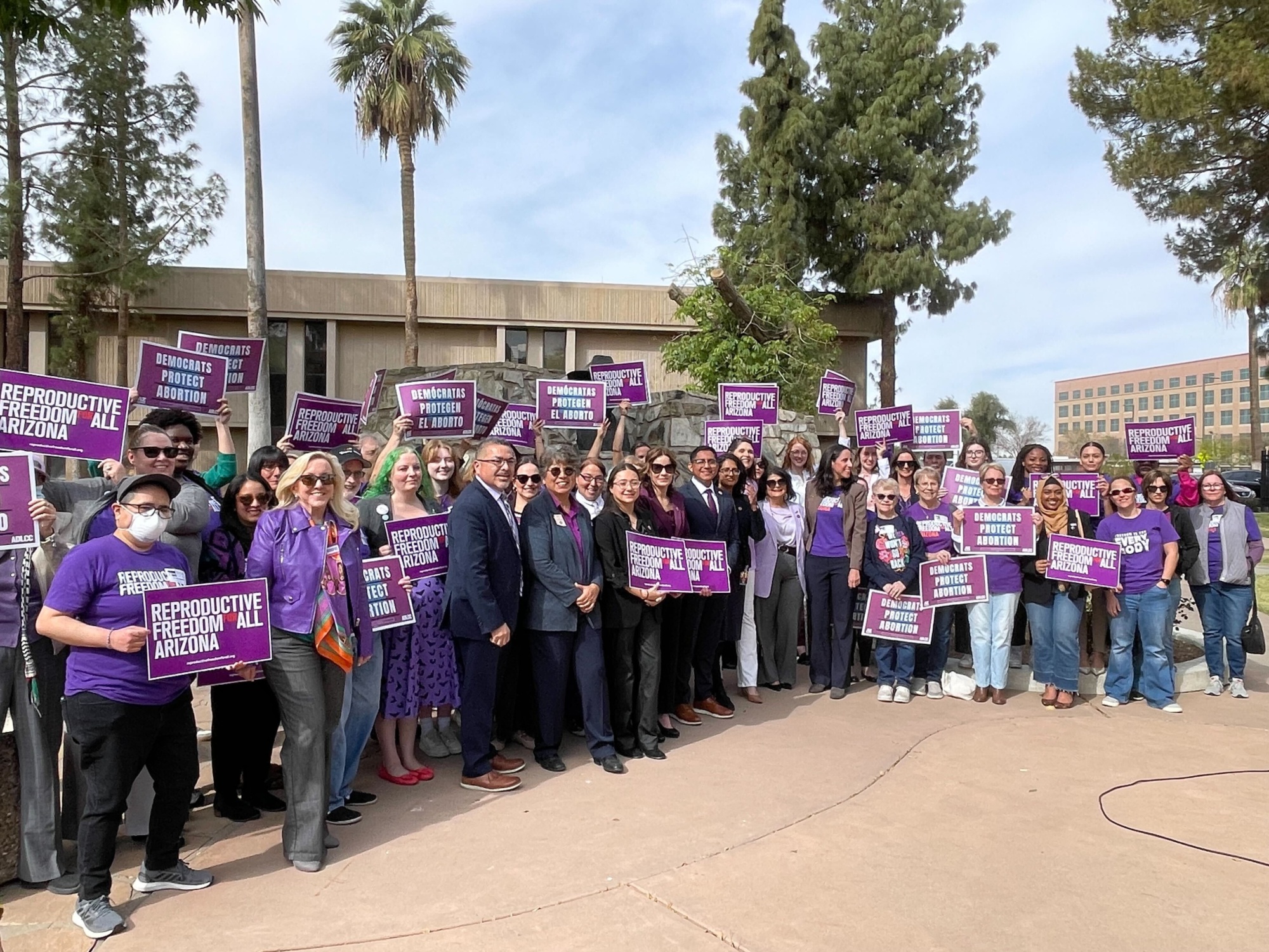 Large group of reproductive freedom activists and supporters at a press conference