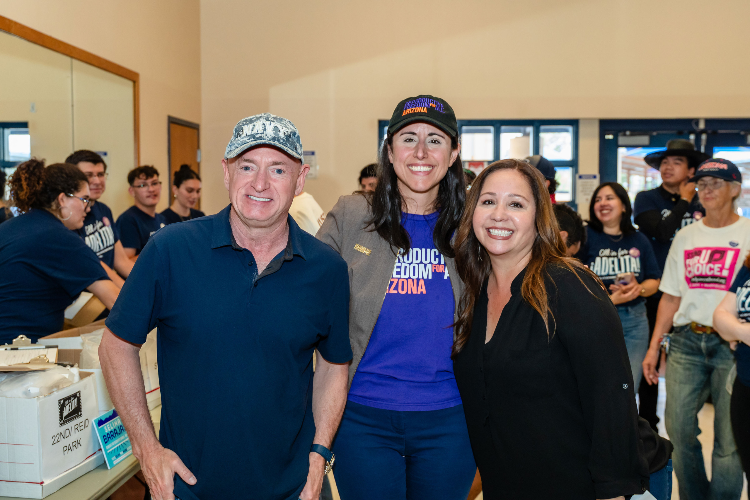 From left: U.S. Senator Mark Kelly, Athena of Reproductive for All Arizona, with Adelita Grijalva.
