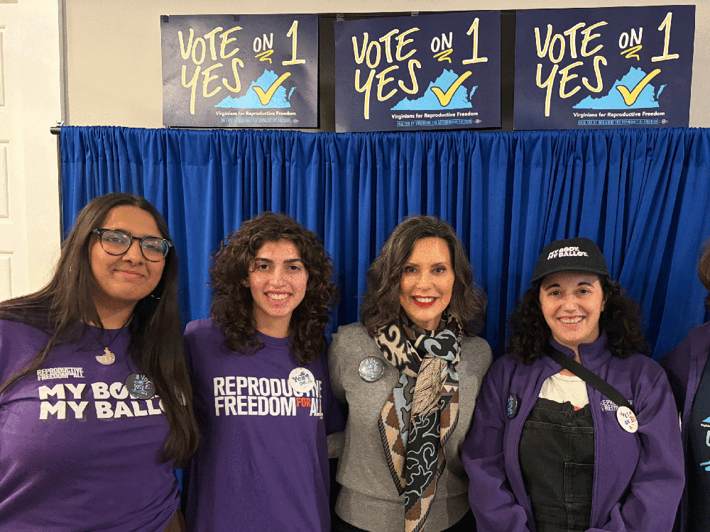 Gov Gretchen Whitmer poses with Repro for All members in Virginia to support Question 1