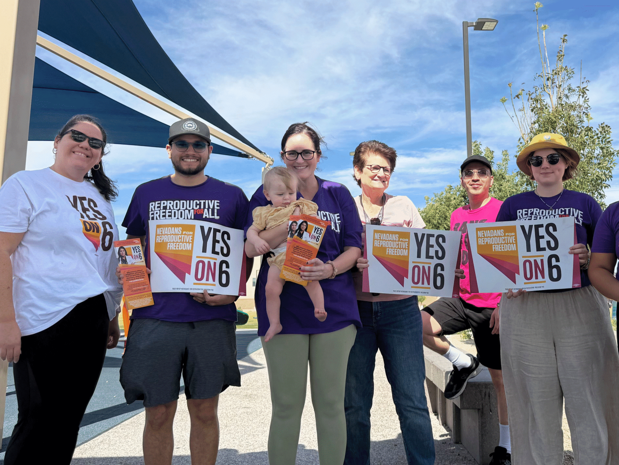 Reproductive Freedom for All Nevada members hold signs in support of Nevada Question 6